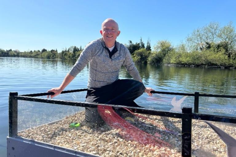Dave Lowe in the purpose-built tern nesting raft 